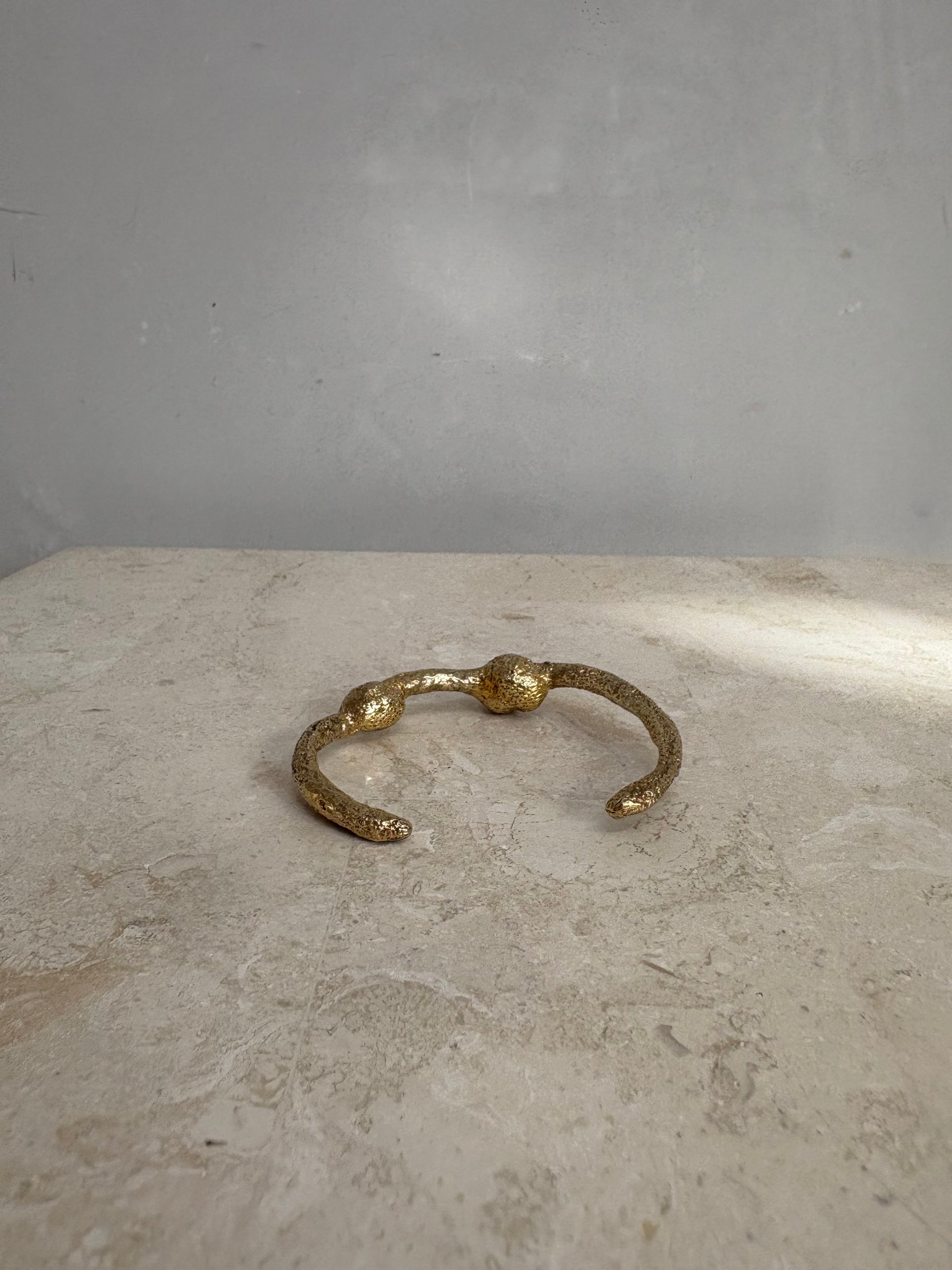 Lucy Folk Dough Knot Cuff In Yellow Gold