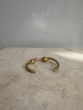 Lucy Folk Dough Knot Cuff In Yellow Gold