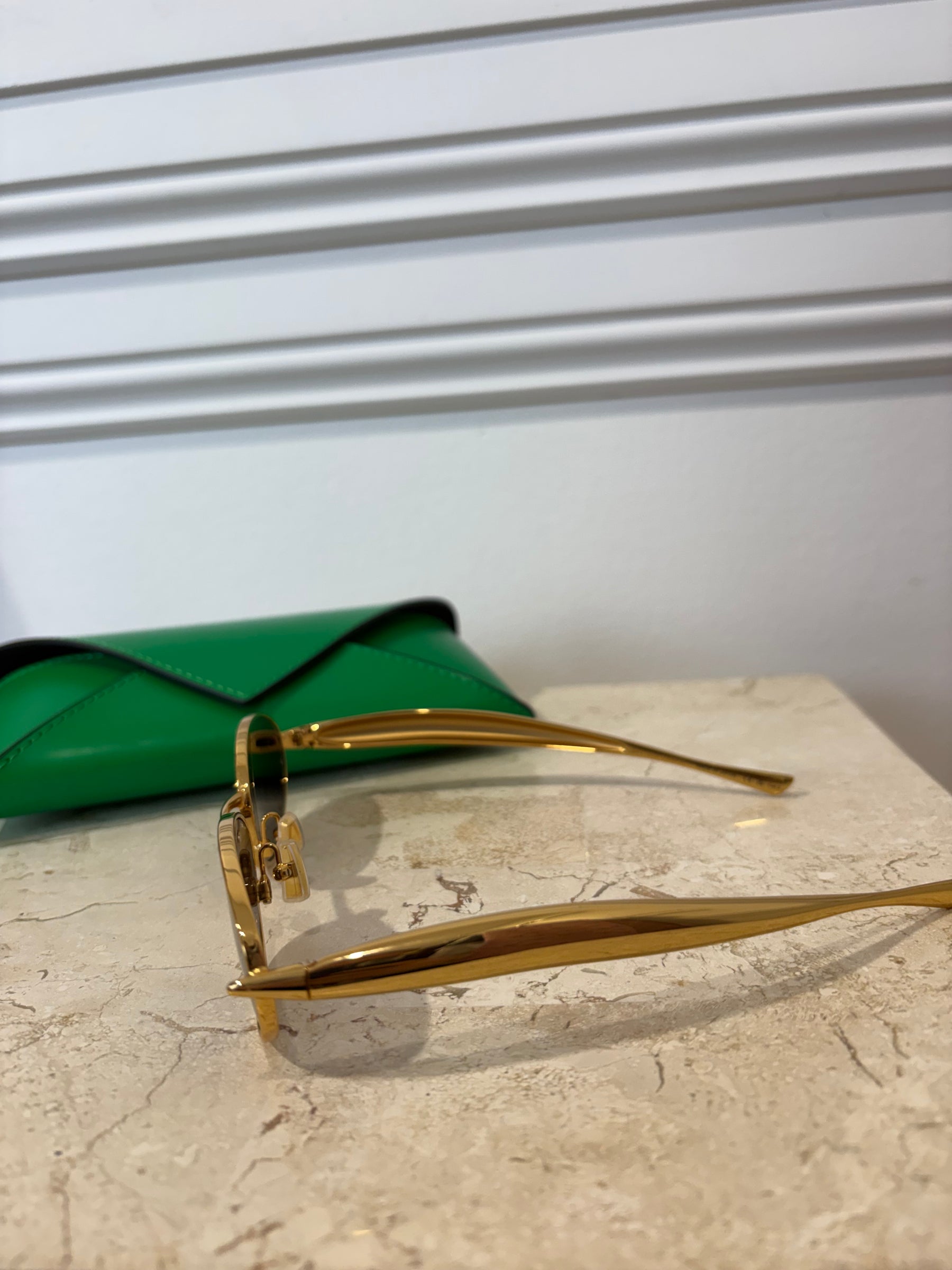 Bottega Veneta Gold Sardine Oval Sunglasses