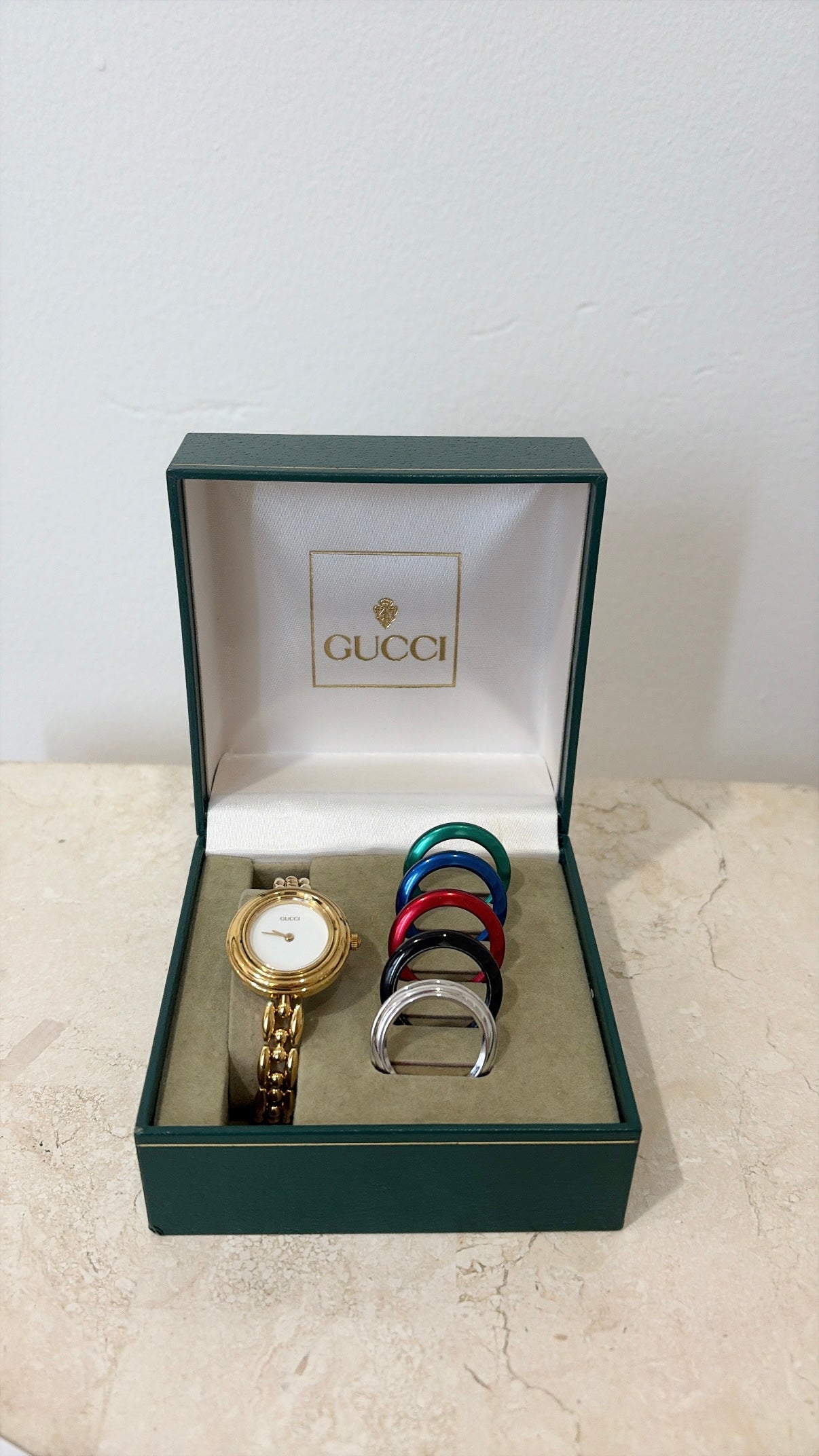 Gucci Gold Tone Interchangeable Bezel Watch
