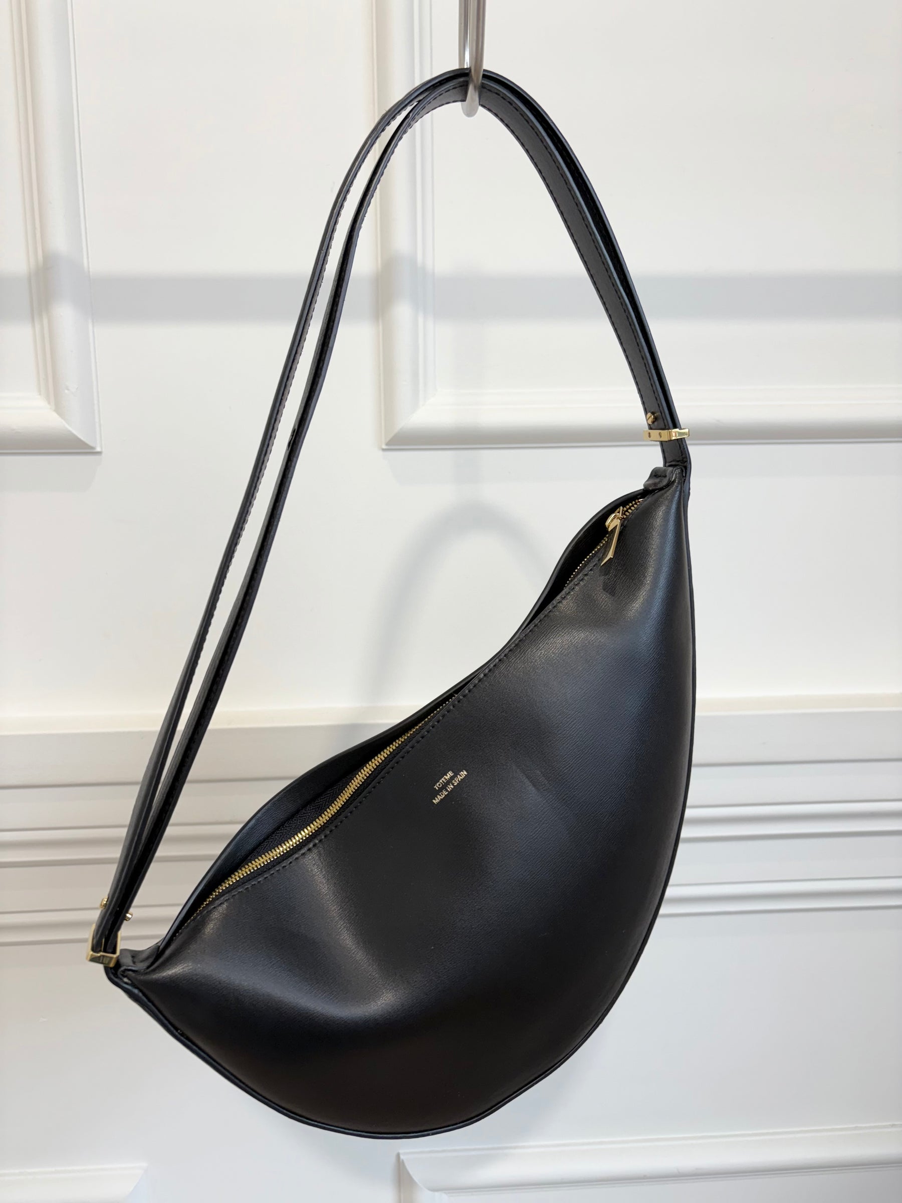 Totême Black Leather Scooped Sling Bag