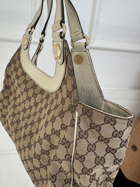Gucci Beige Monogram Charmy Leather Bag