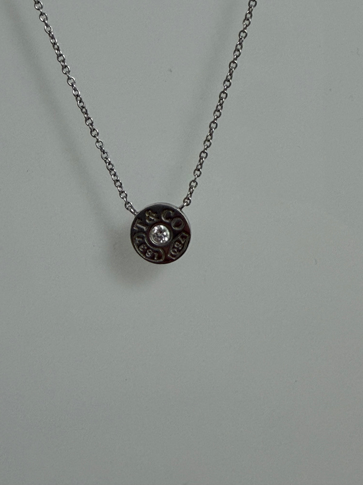 Tiffany & Co. White Gold Diamond Logo Pendant Necklace