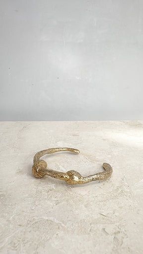 Lucy Folk Dough Knot Cuff In Yellow Gold
