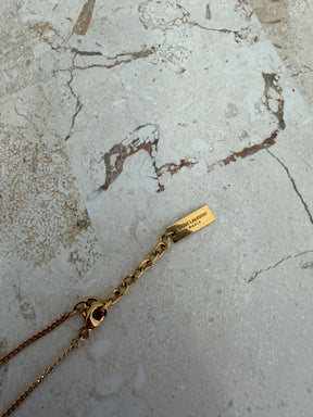 Saint Laurent Gold Tone Logo Charm Bracelet