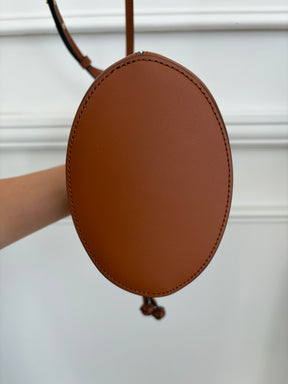 Aje Tan Leather Woven Trim Bucket Bag