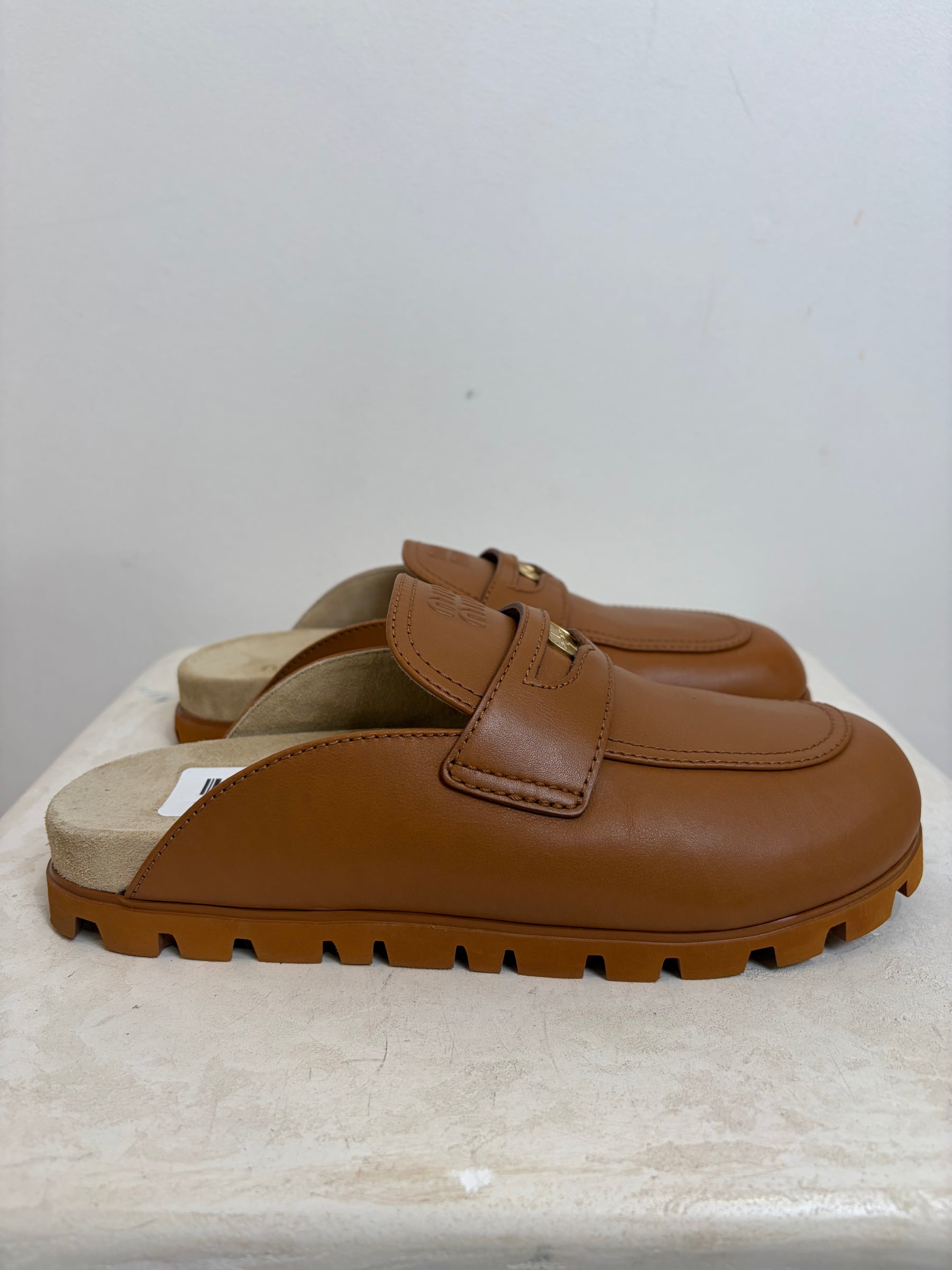 Miu Miu Logo Leather Mules In Cognac, 39.5