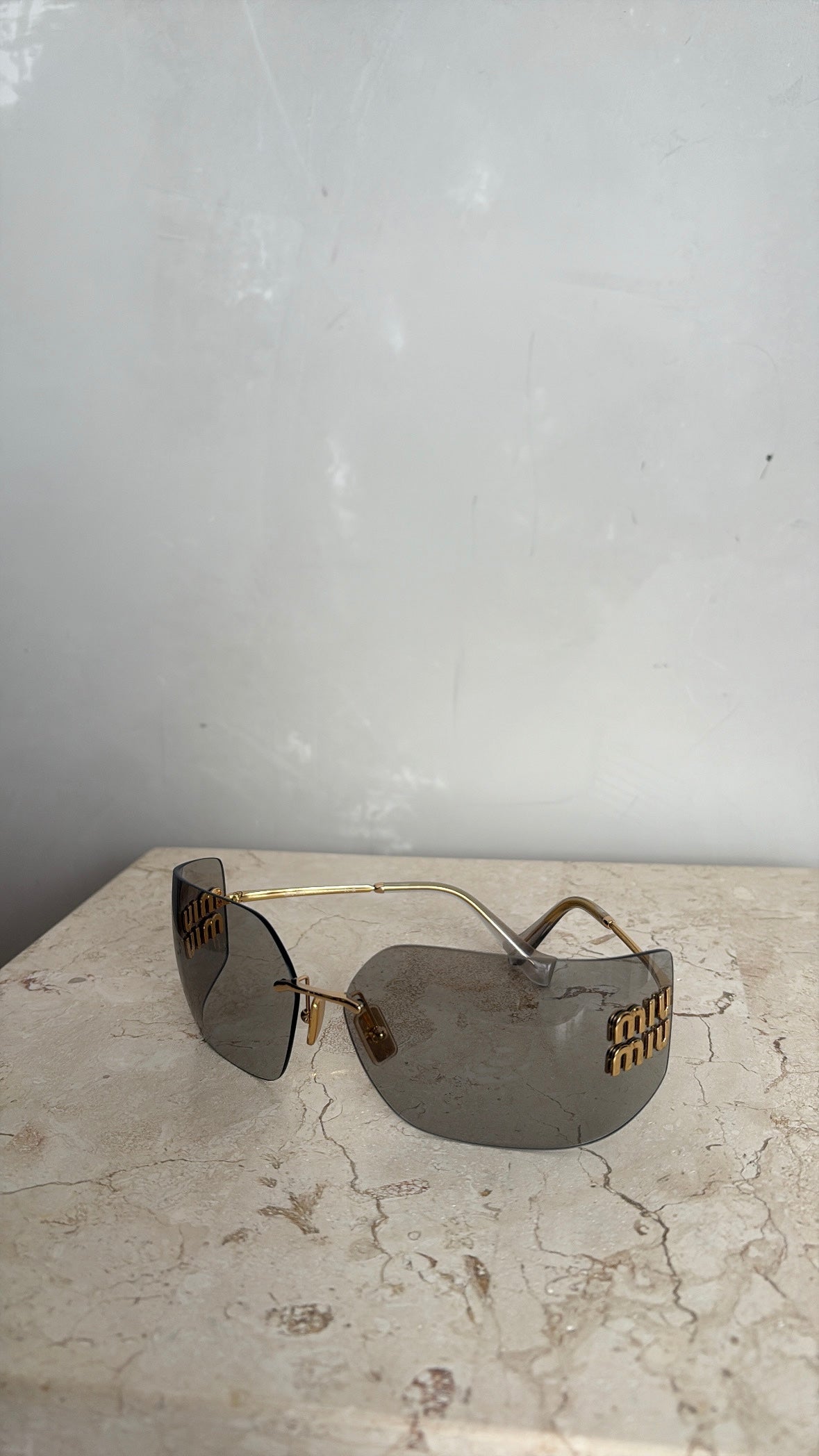 Miu Miu Grey and Gold Wrap Around Logo Sunglasses