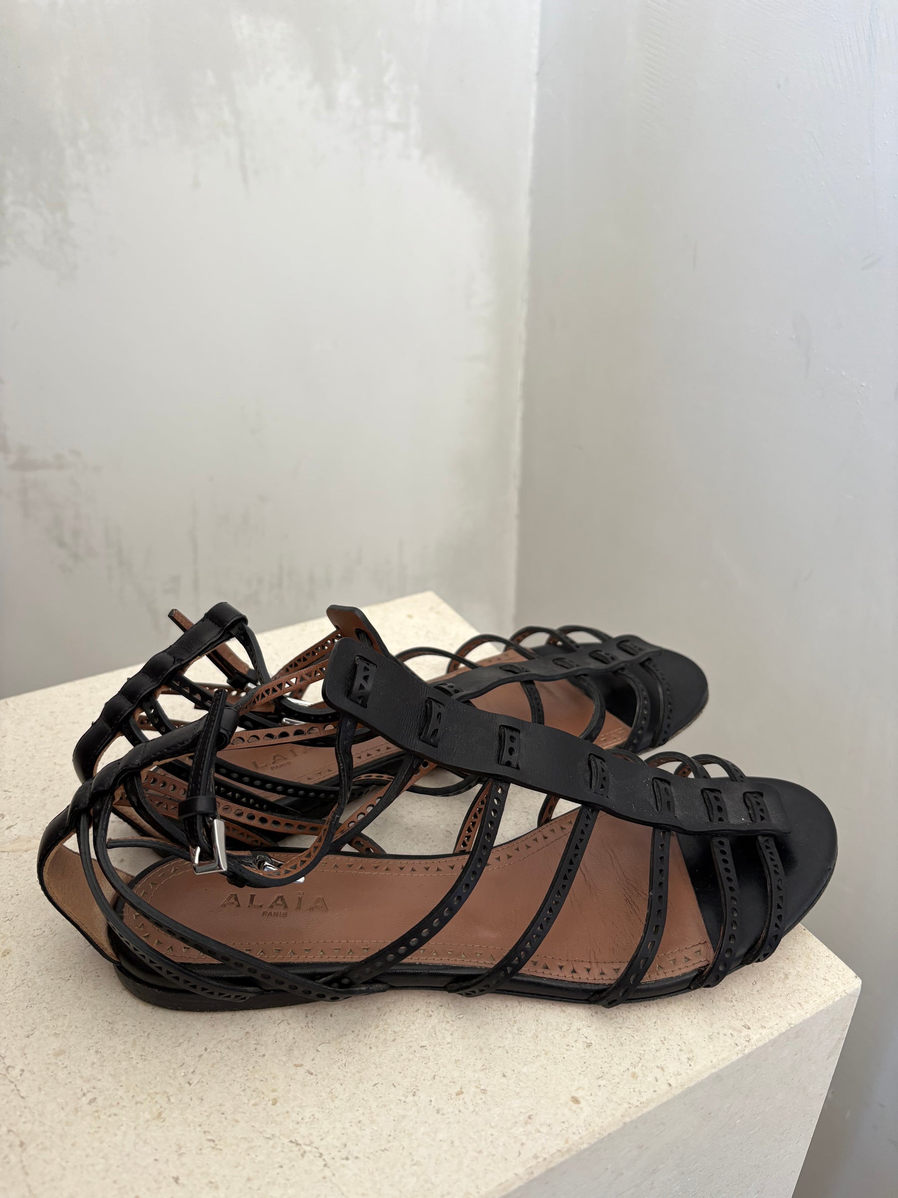 Alaia Black Leather Laser Gladiator Sandal, 38