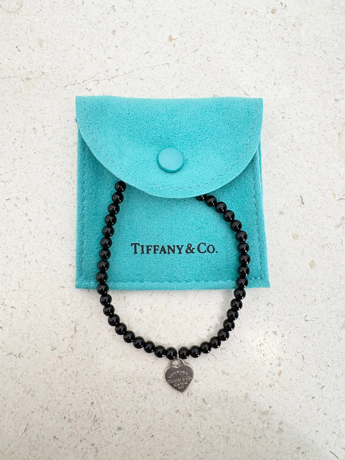 Tiffany & Co. Onyx and Silver Heart Charm Bracelet