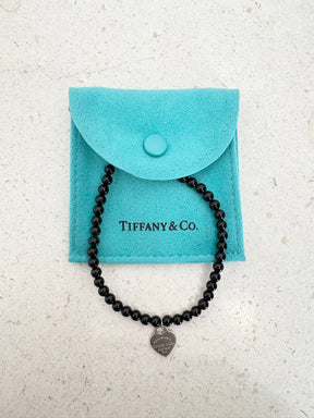 Tiffany & Co. Onyx and Silver Heart Charm Bracelet
