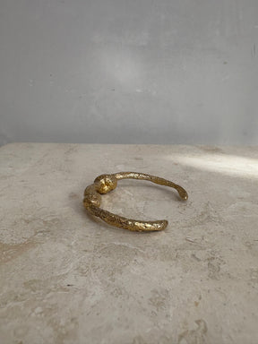Lucy Folk Dough Knot Cuff In Yellow Gold