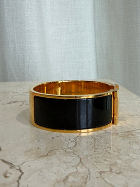 Hermès Clic H Wide Black With Yellow Gold, PM