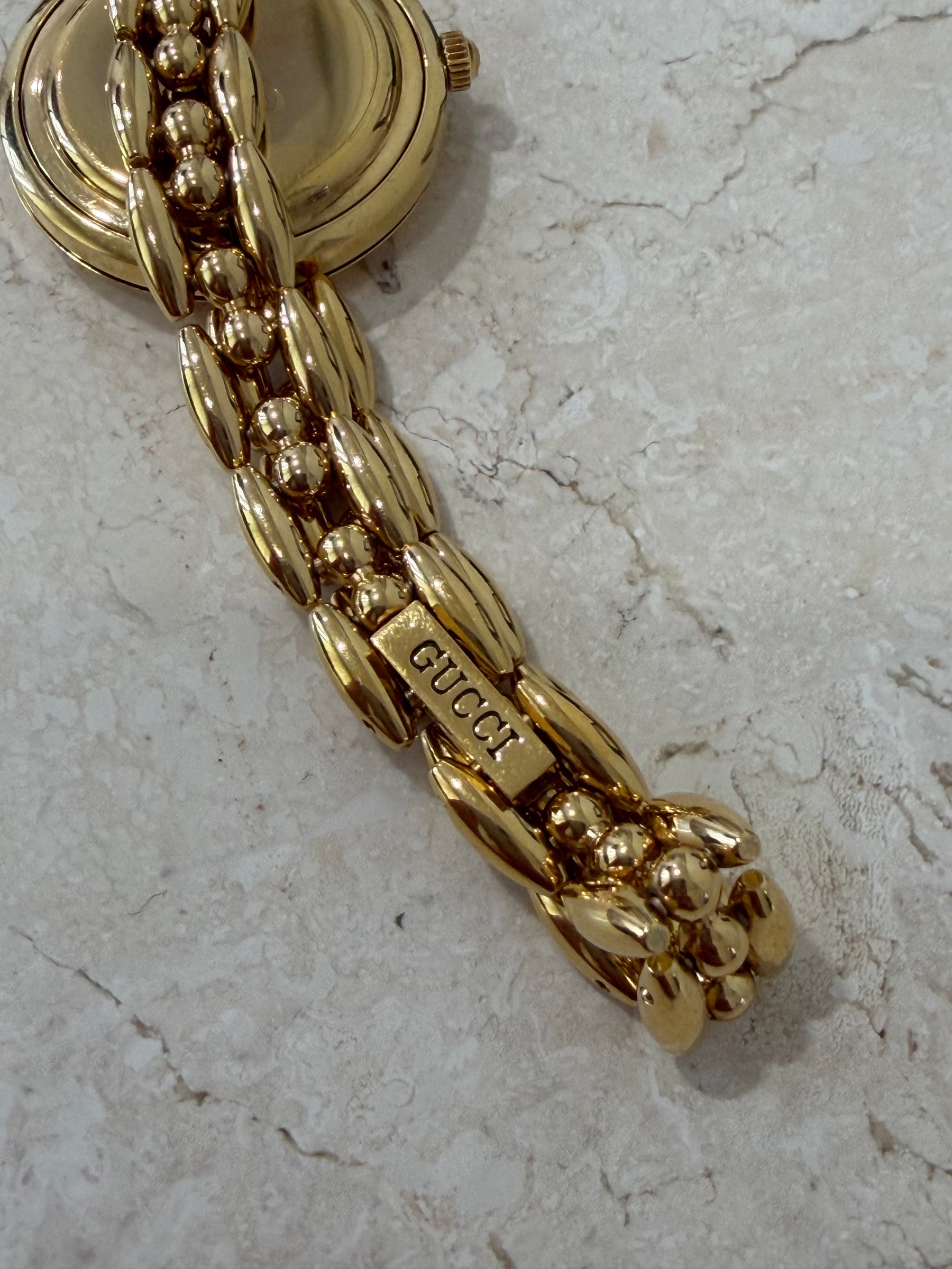 Gucci Gold Tone Interchangeable Bezel Watch
