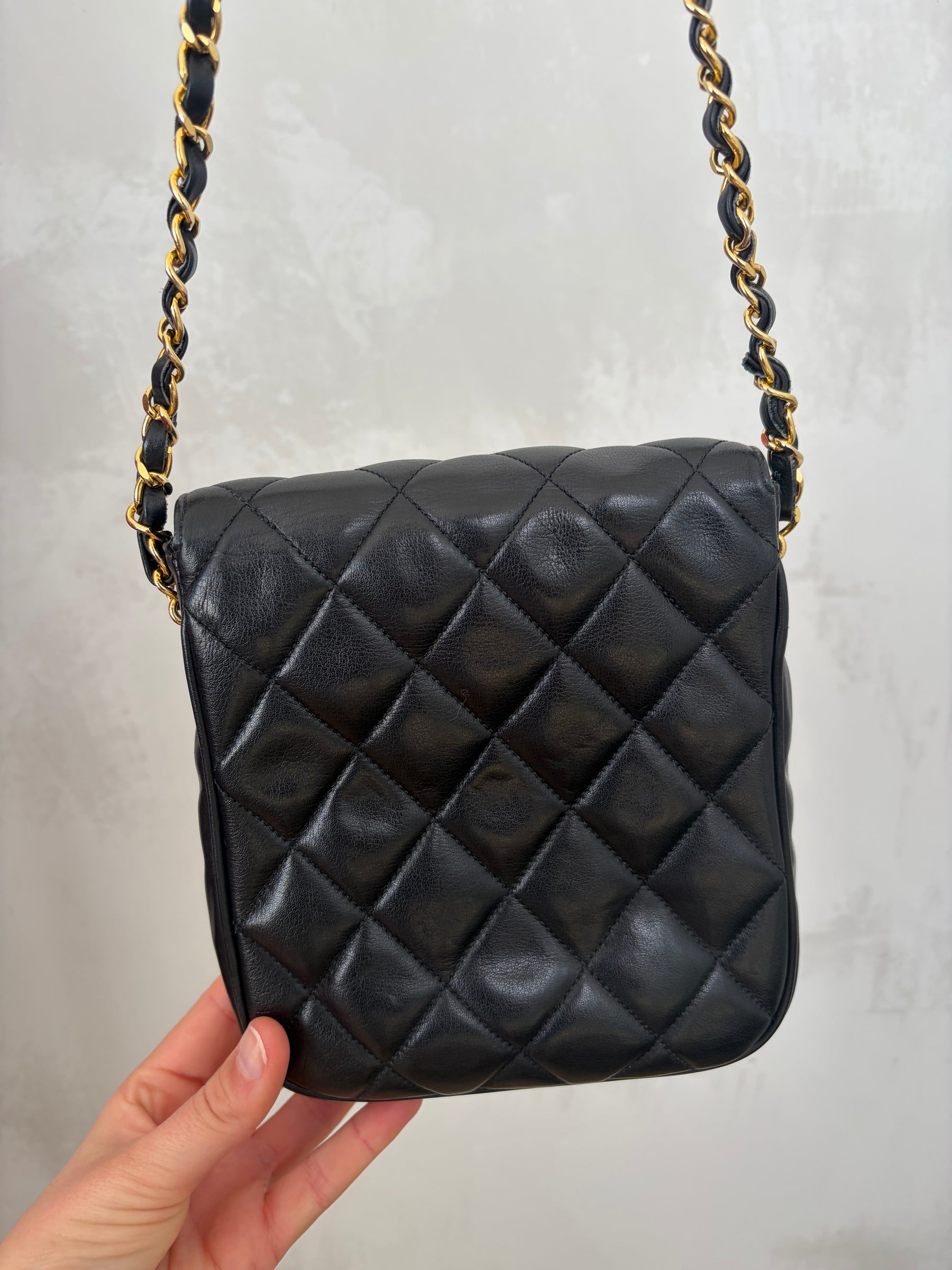 Chanel Black Lambskin Leather Vertical Mini Flap bag
