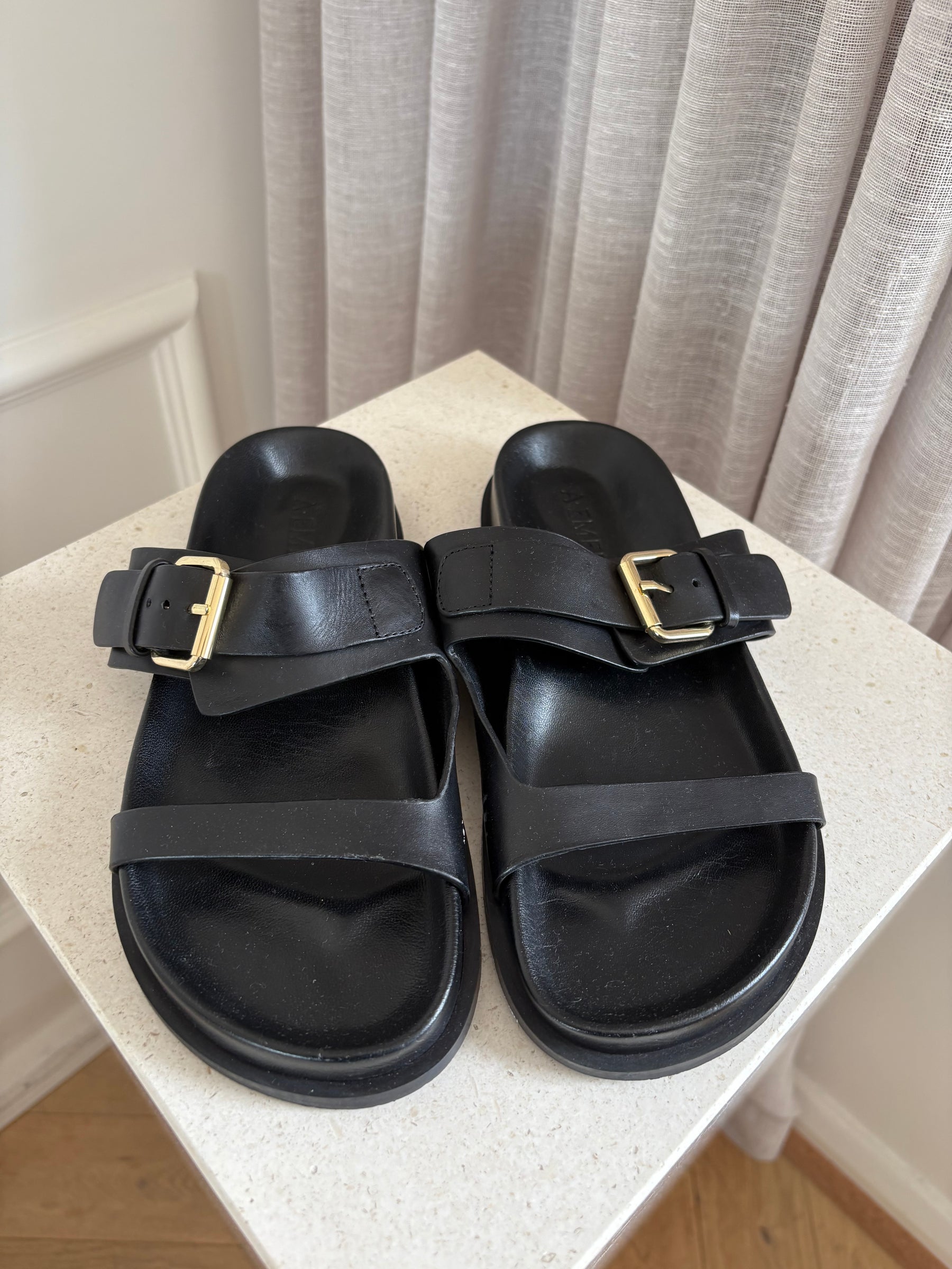 A Emery Black Leather Buckle Slides, 37