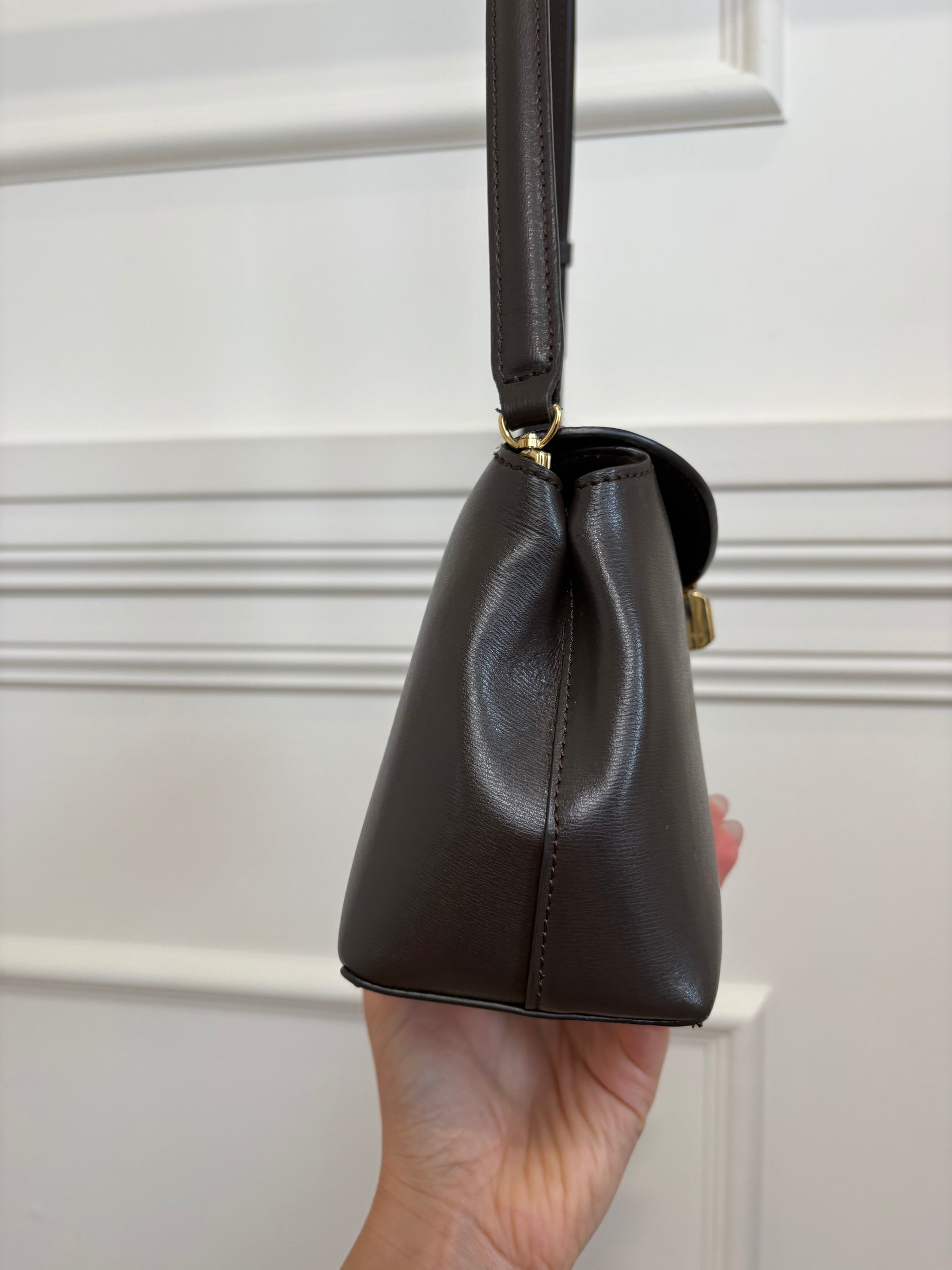 Totême Brown T-Lock Small leather clutch