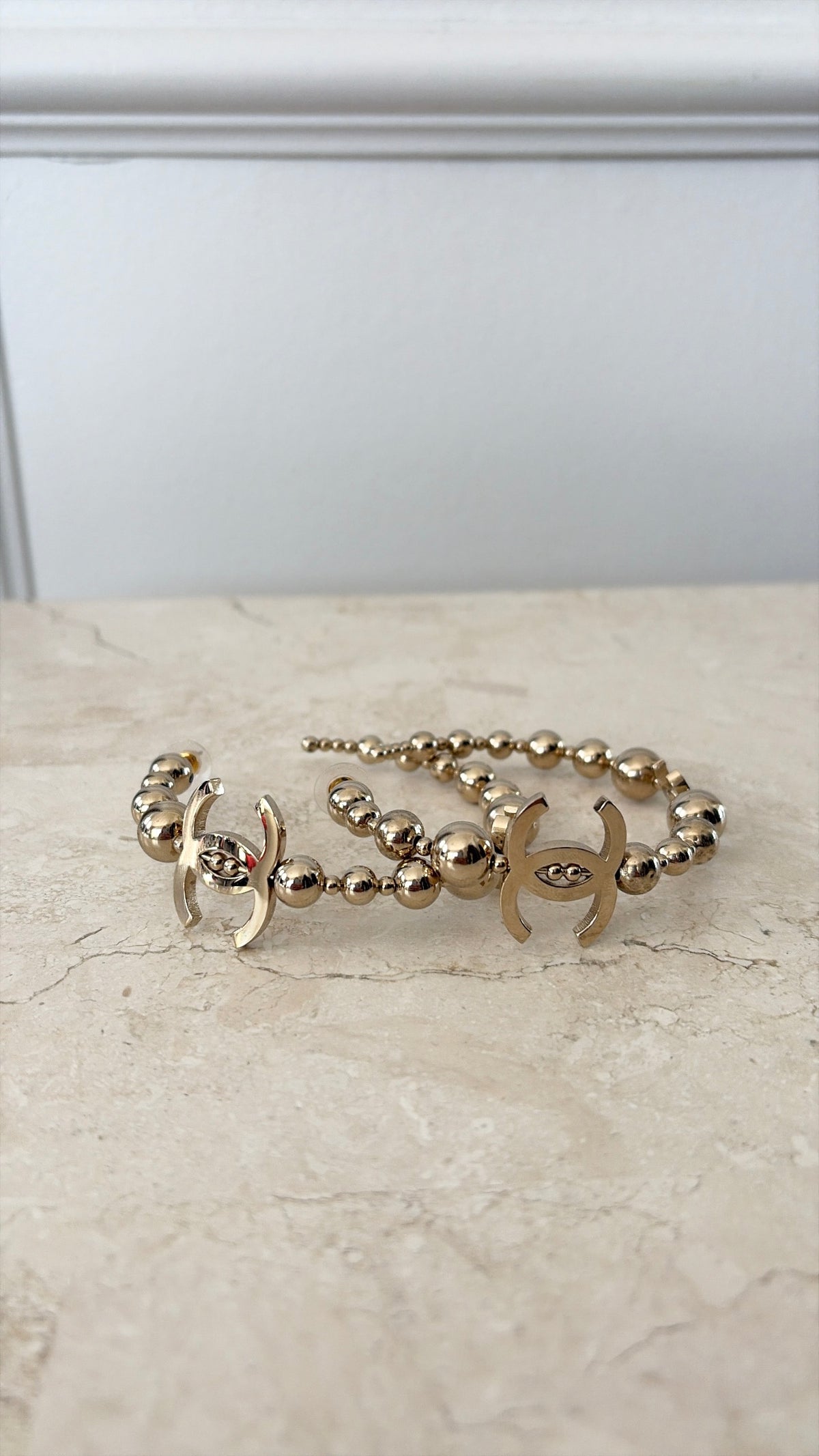 Chanel Gold Tone Ball Logo Hoops