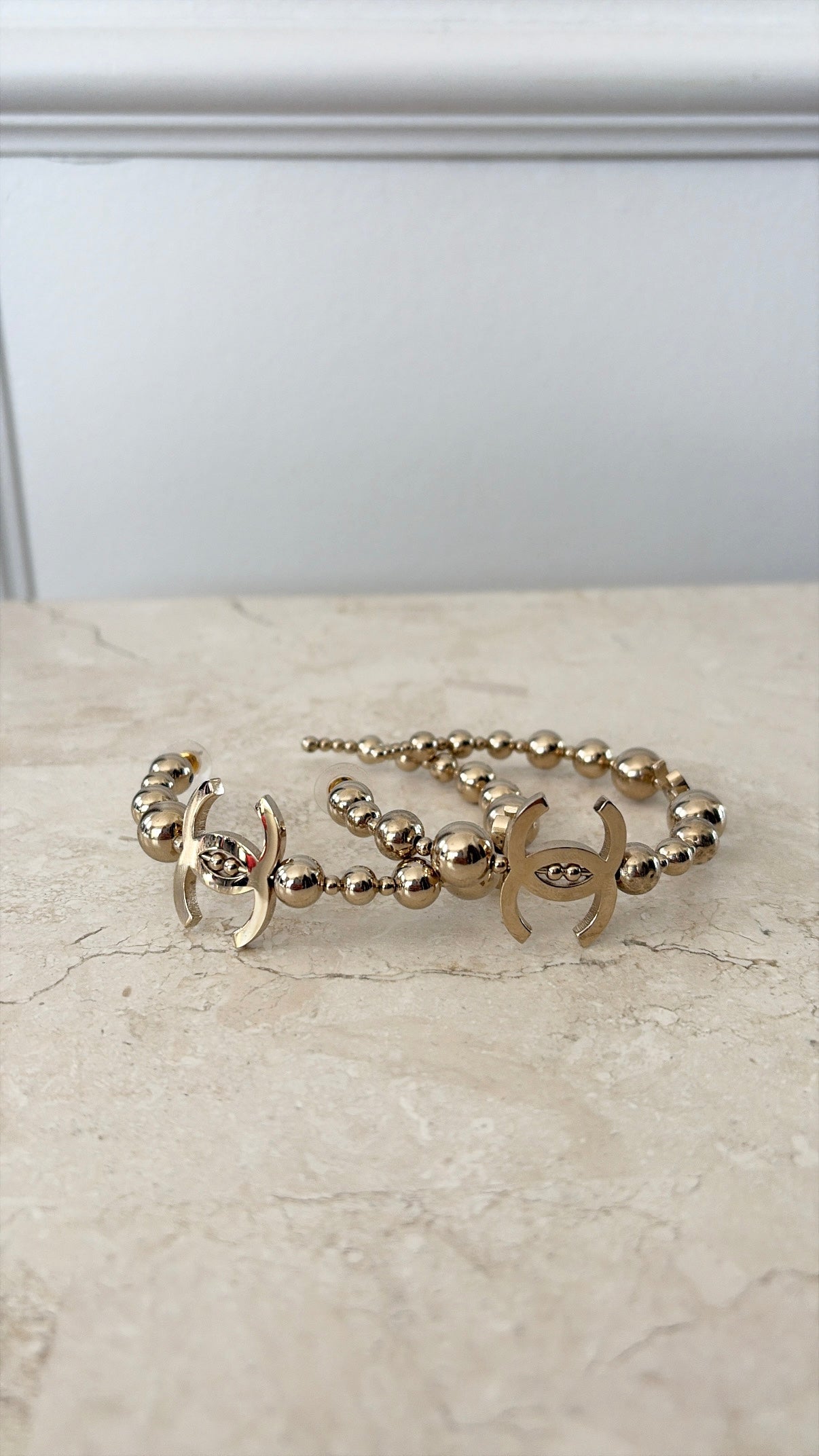 Chanel Gold Tone Ball Logo Hoops