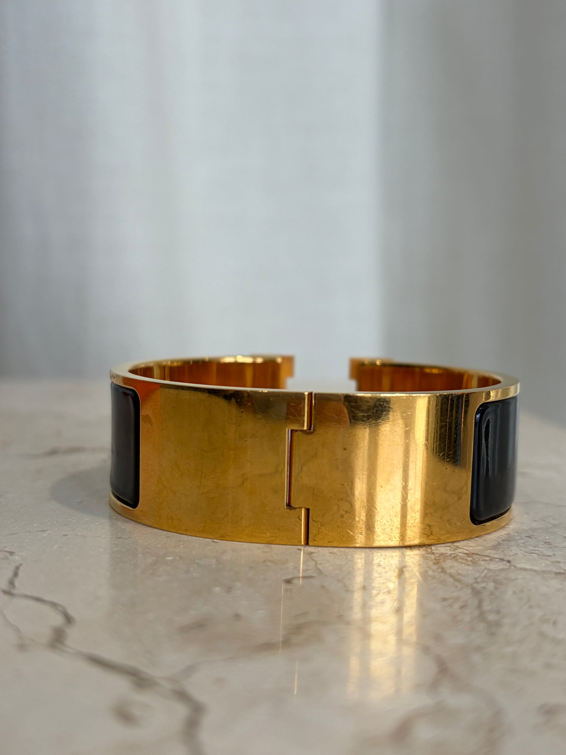 Hermès Clic H Wide Black With Yellow Gold, PM