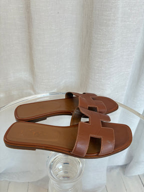 Hermès Gold Leather Oran Sandals, 39.5