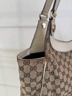 Gucci Beige Monogram Charmy Leather Bag