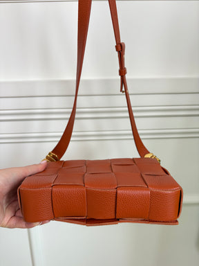 Bottega Veneta Terracotta Leather Woven Charm Cassette Bag