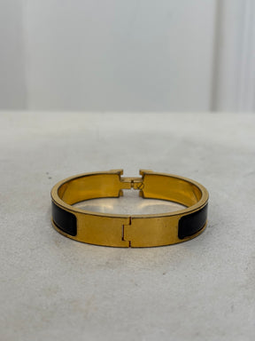 Hermès Black and Gold Clic H Bracelet