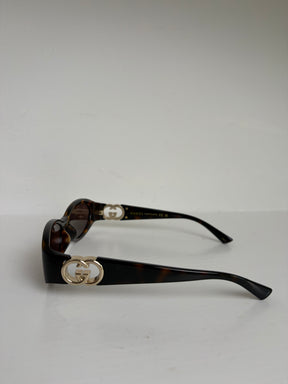 Gucci Tortoiseshell Oval Logo Arm Sunglasses