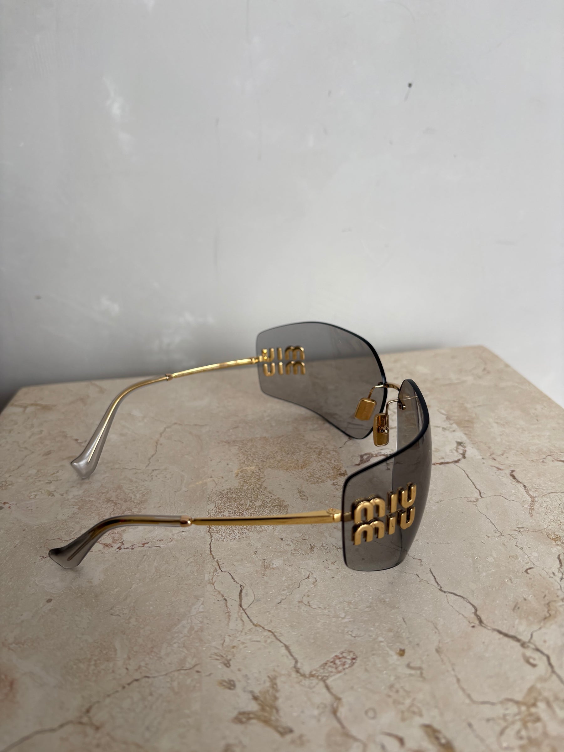 Miu Miu Grey and Gold Wrap Around Logo Sunglasses