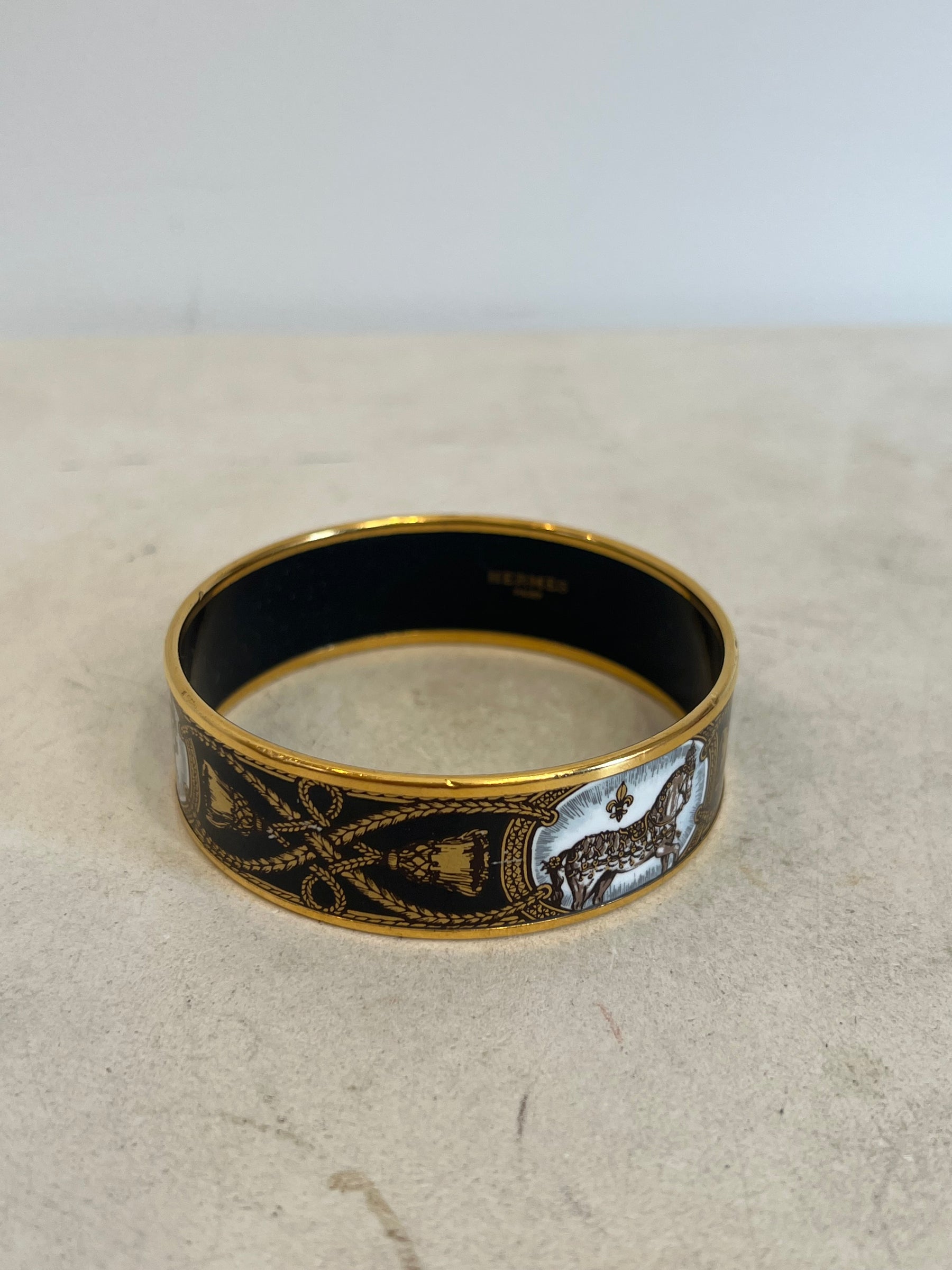 Hermès Gold Tone and Black Enamel Thick Bangle
