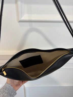 Totême Black Leather Scooped Sling Bag