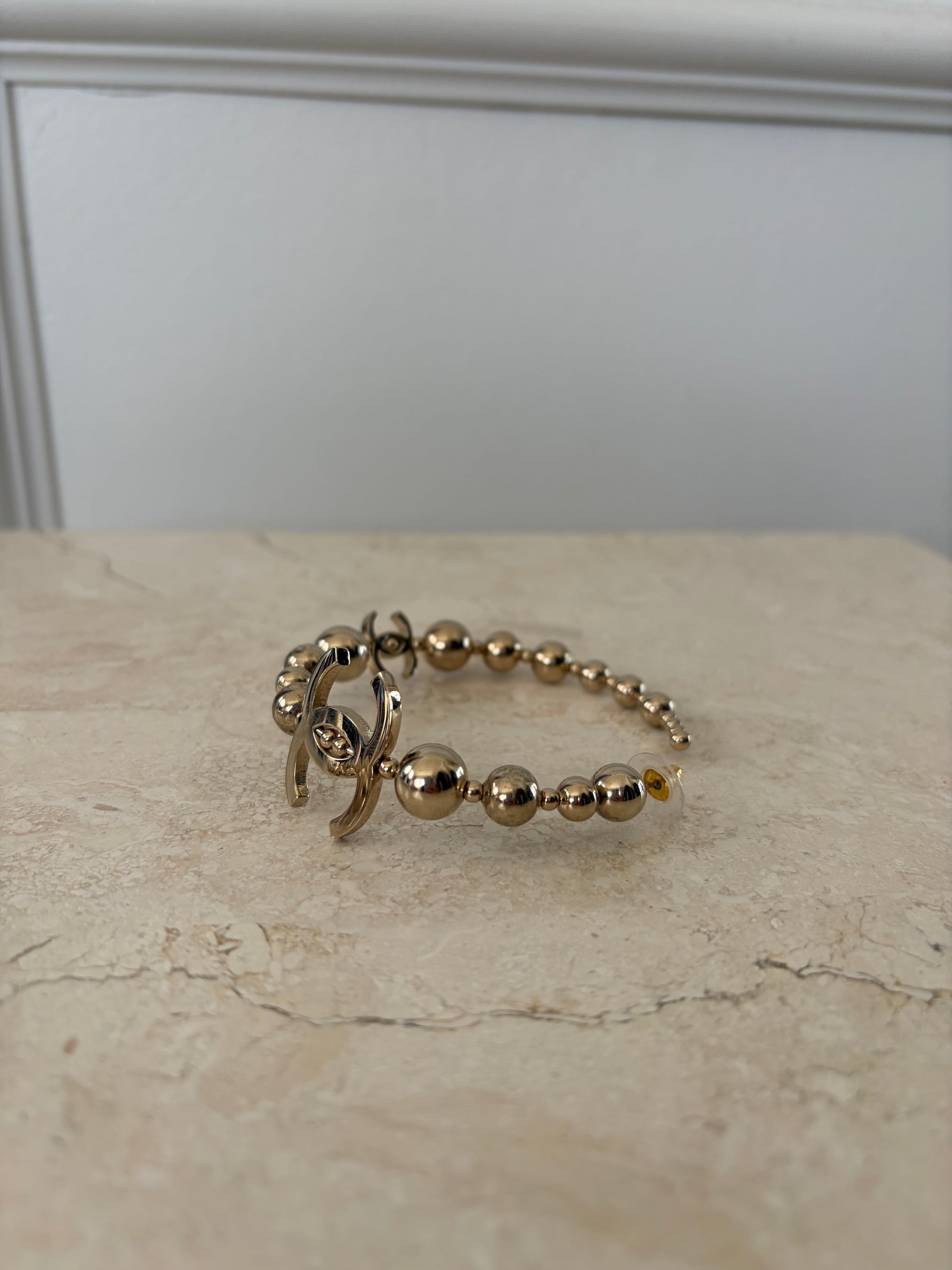 Chanel Gold Tone Ball Logo Hoops