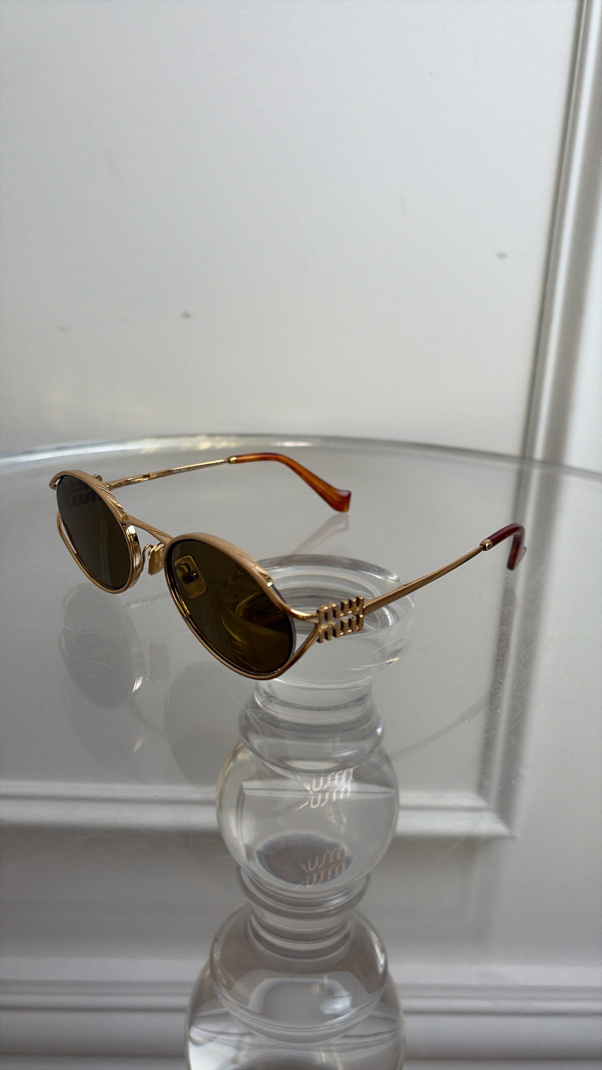Miu Miu Gold Oval Logo Sunglasses