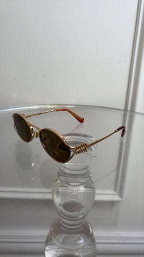 Miu Miu Gold Oval Logo Sunglasses