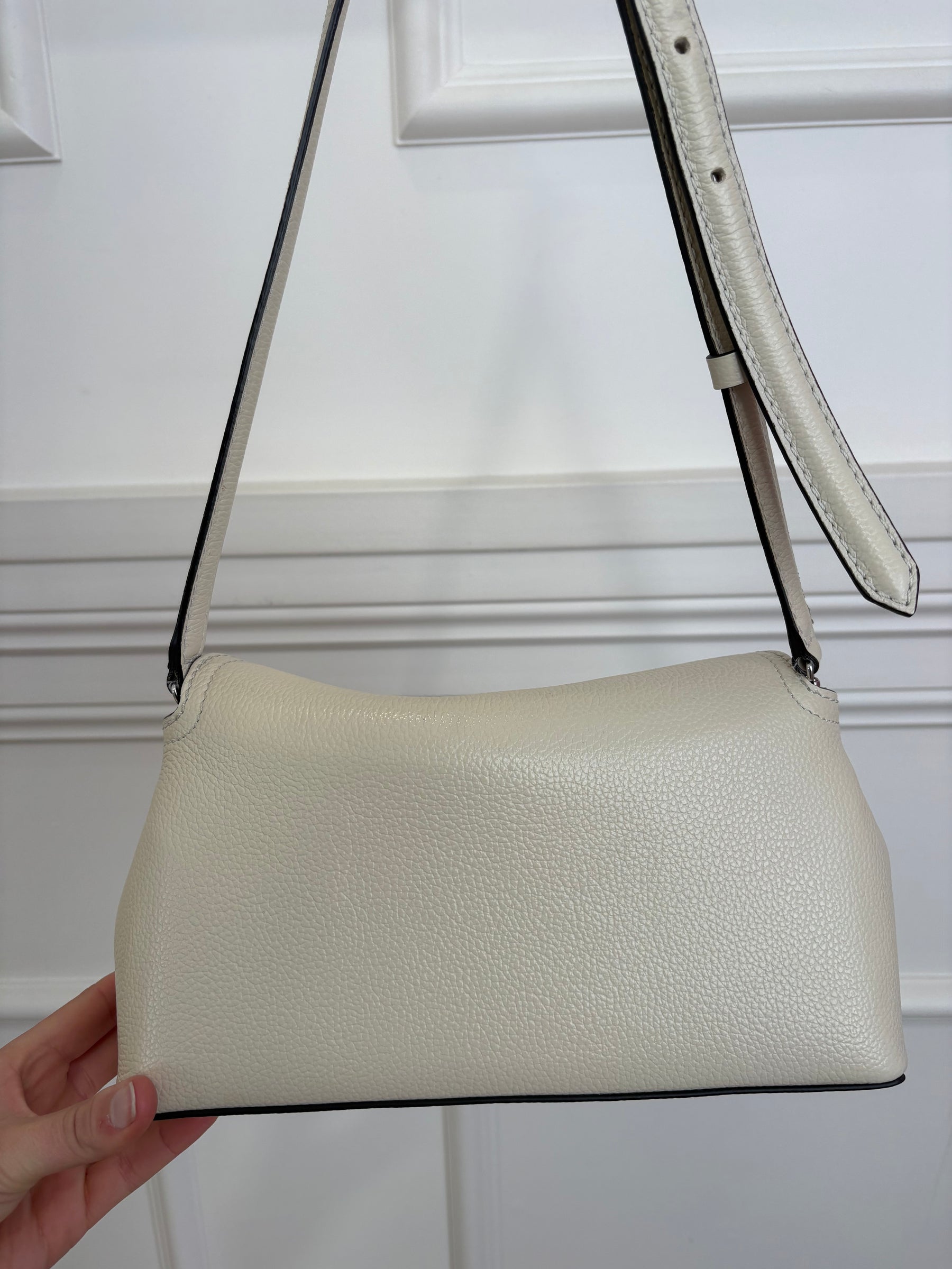 Totême T-Lock Textured Leather Clutch Cream