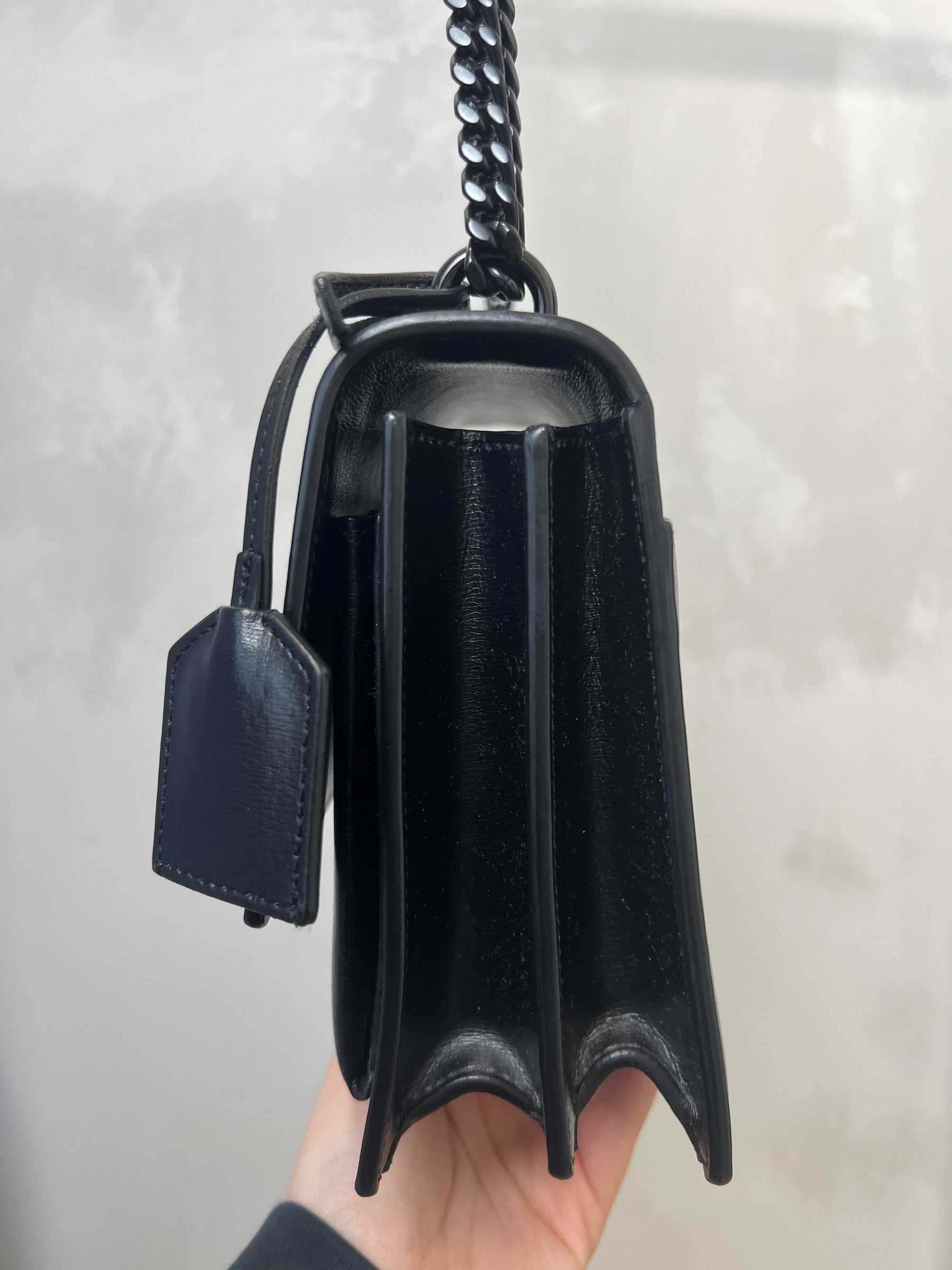 Saint Laurent Black Leather Sunset Bag with Black Hardware
