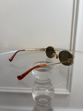 Miu Miu Gold Oval Logo Sunglasses
