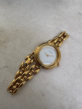 Gucci Gold Tone Interchangeable Bezel Watch