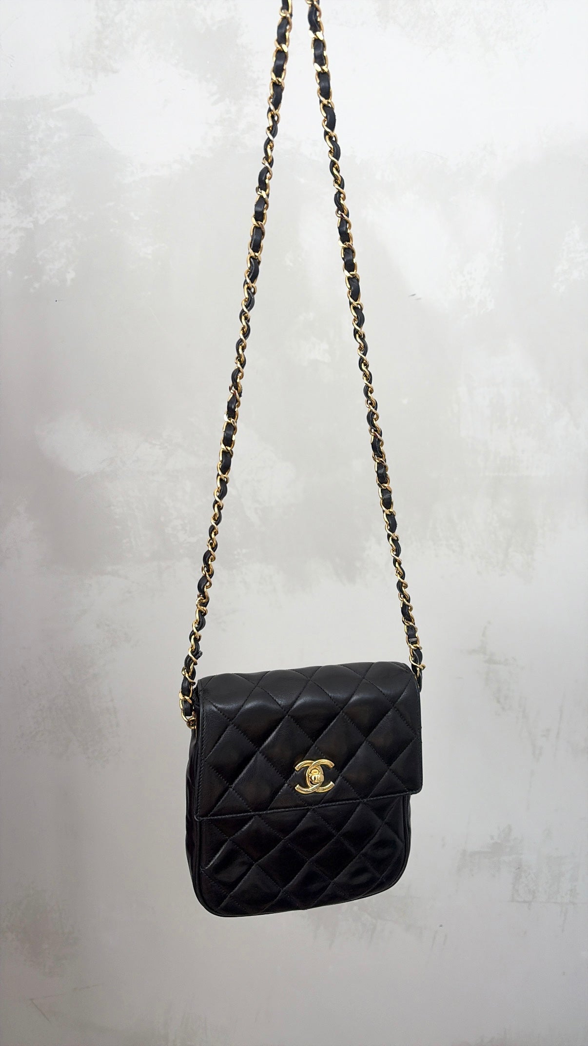 Chanel Black Lambskin Leather Vertical Mini Flap bag