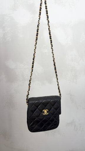 Chanel Black Lambskin Leather Vertical Mini Flap bag