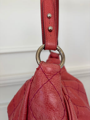 Chanel Crinkled Leather On The Road Flap Bag In Coral