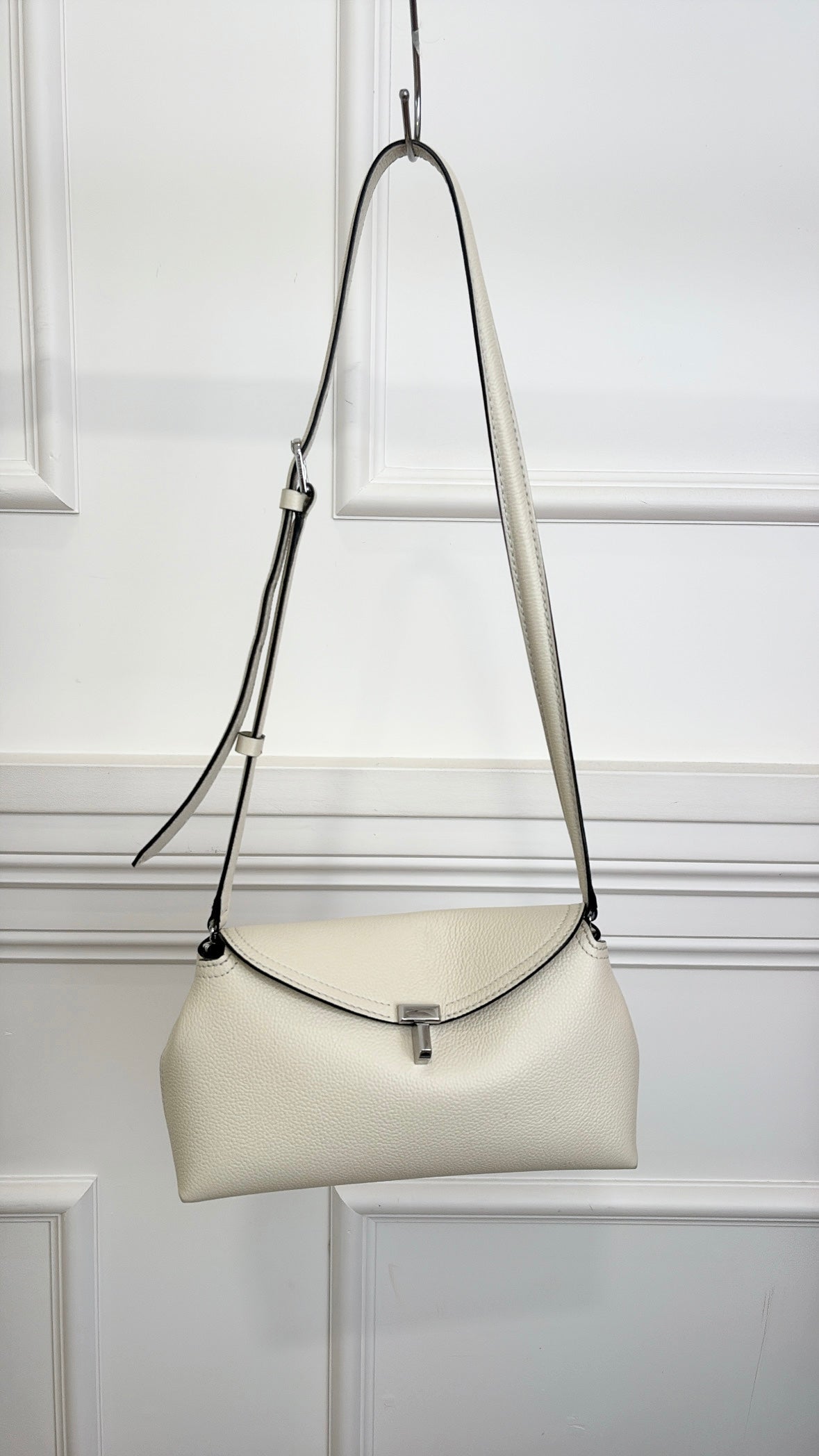 Totême T-Lock Textured Leather Clutch Cream