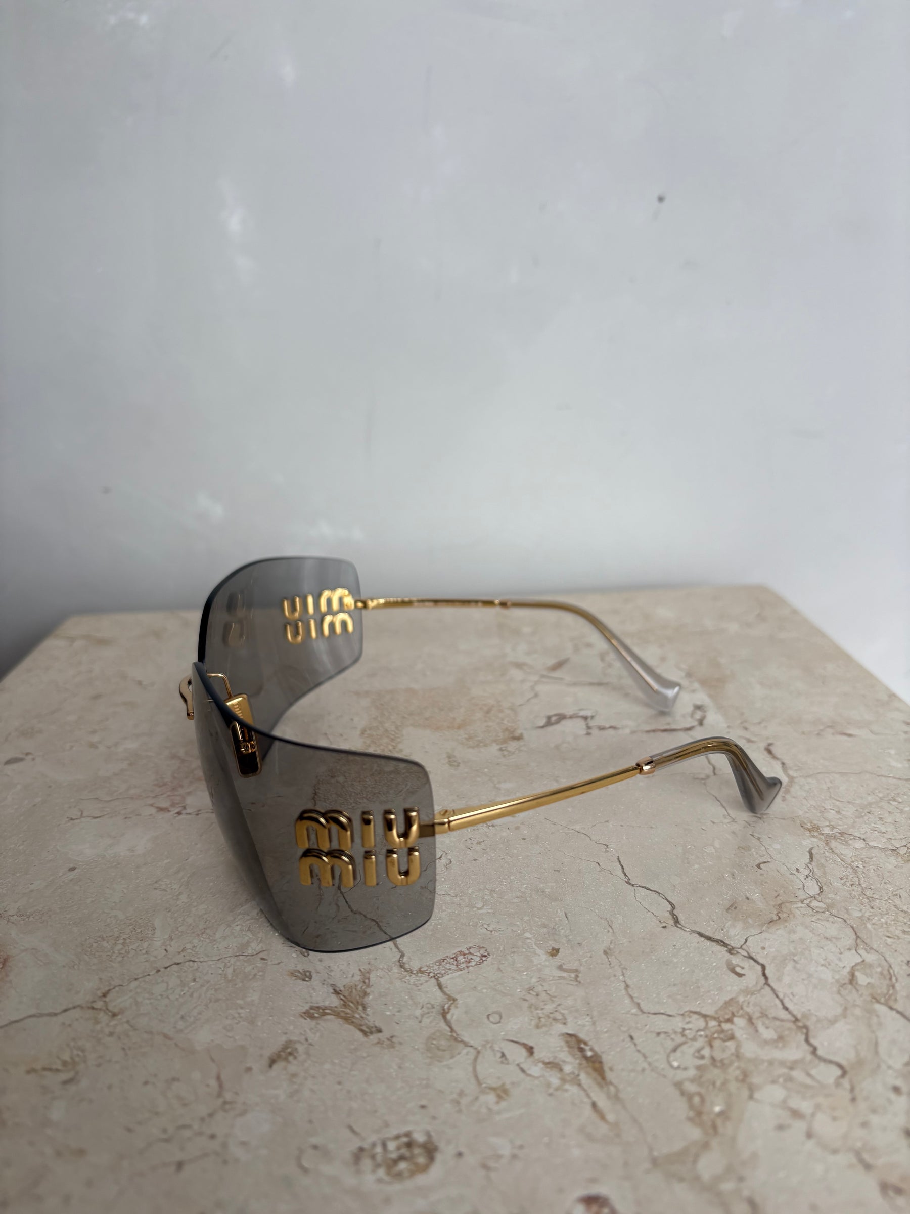 Miu Miu Grey and Gold Wrap Around Logo Sunglasses