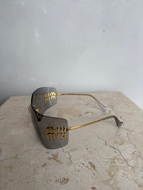 Miu Miu Grey and Gold Wrap Around Logo Sunglasses