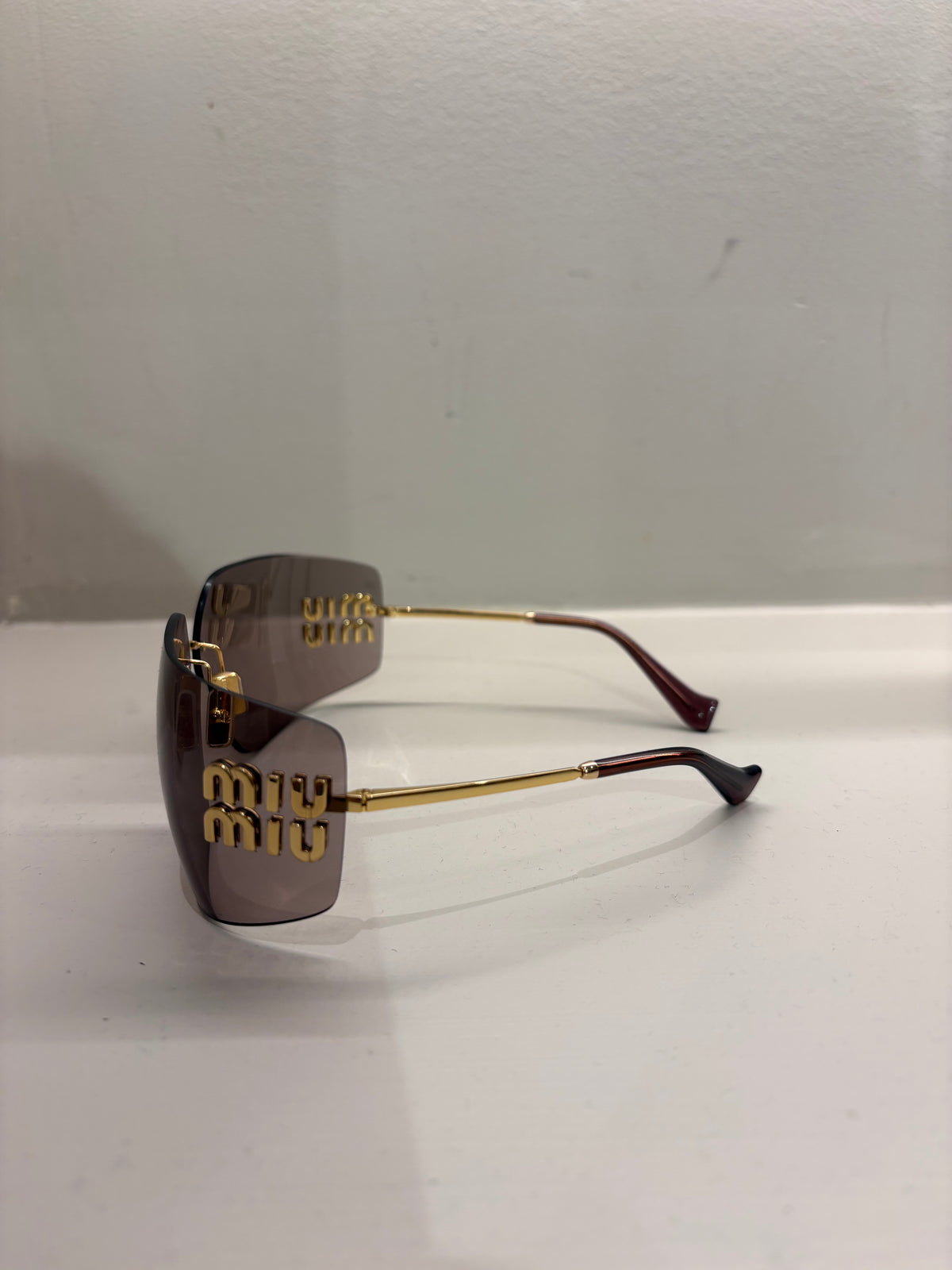 Miu Miu Wrap Around Sunglasses