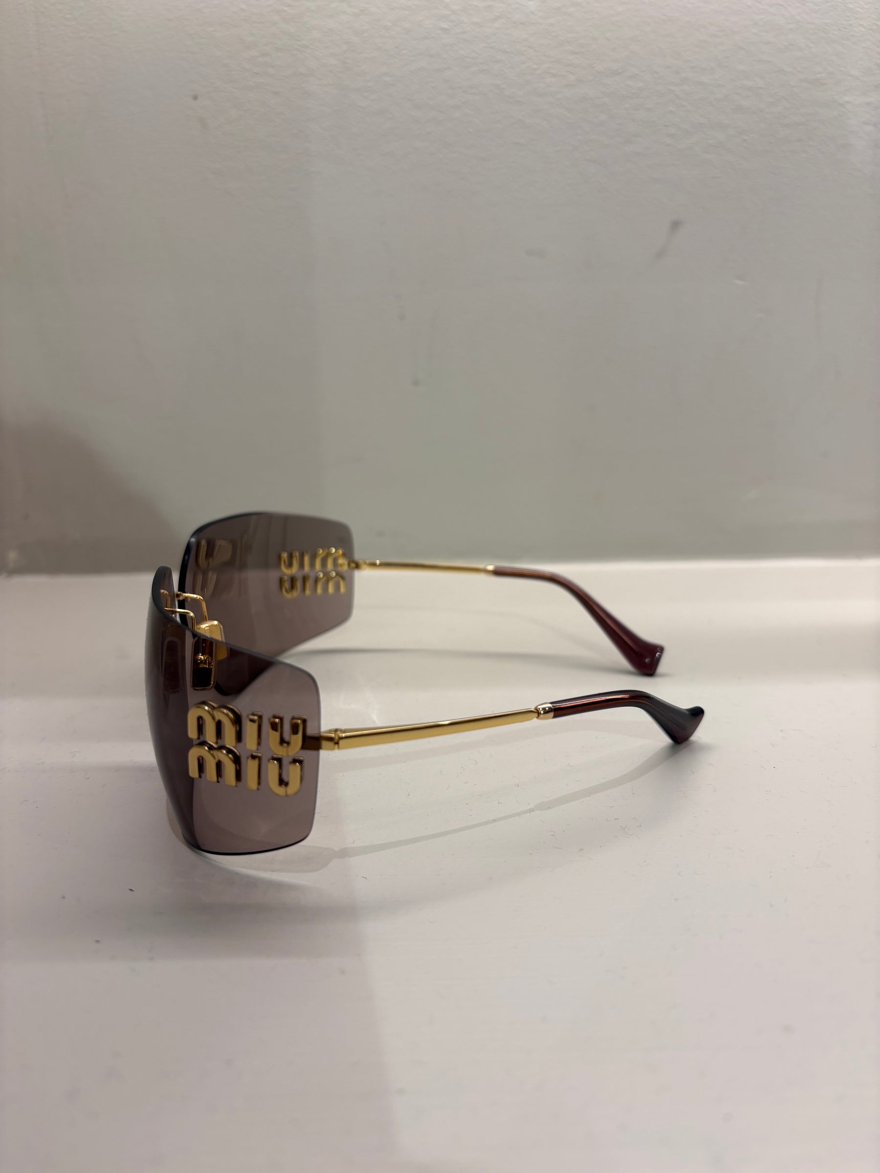 Miu Miu Wrap Around Sunglasses