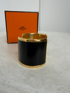 Hermès Black and Gold Leather Olympe cuff bracelet