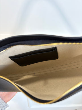 Totême Black Leather Scooped Sling Bag