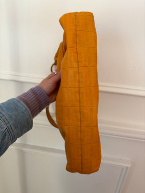 Fendi Orange Perforated Monogram Chef Bag